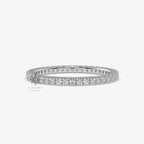 0.85 ct round moissanite eternity band in white gold