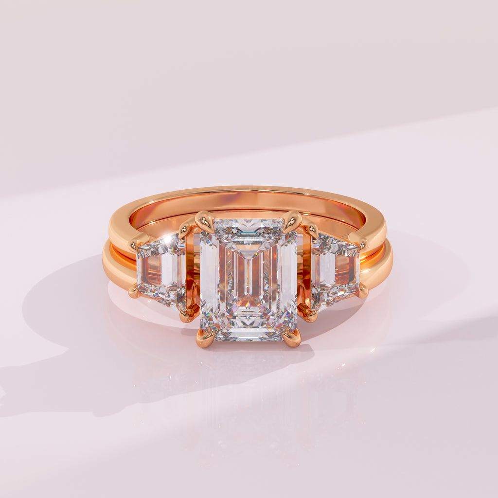 Rose gold ring with a large diamond and smaller diamonds on a light background