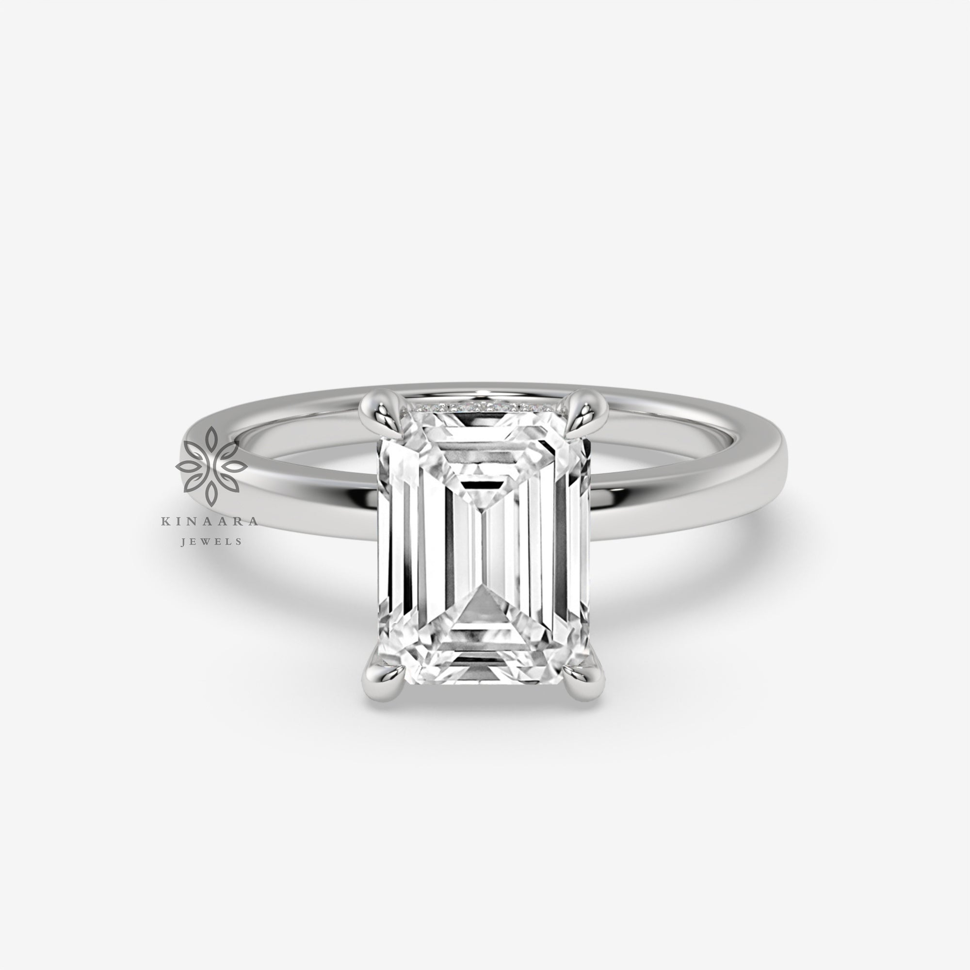 emerald solitaire engagement ring