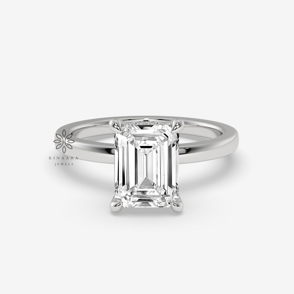 emerald solitaire engagement ring