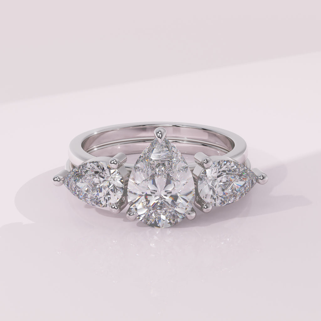 Custom pear moissanite diamond ring enhancer wrap for a personalized bridal set