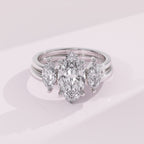 Double marquise diamond guard band with symmetrical marquise stones for a modern bridal look.
