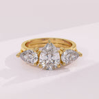 Double pear diamond wedding ring guard band with matching pear cut stones