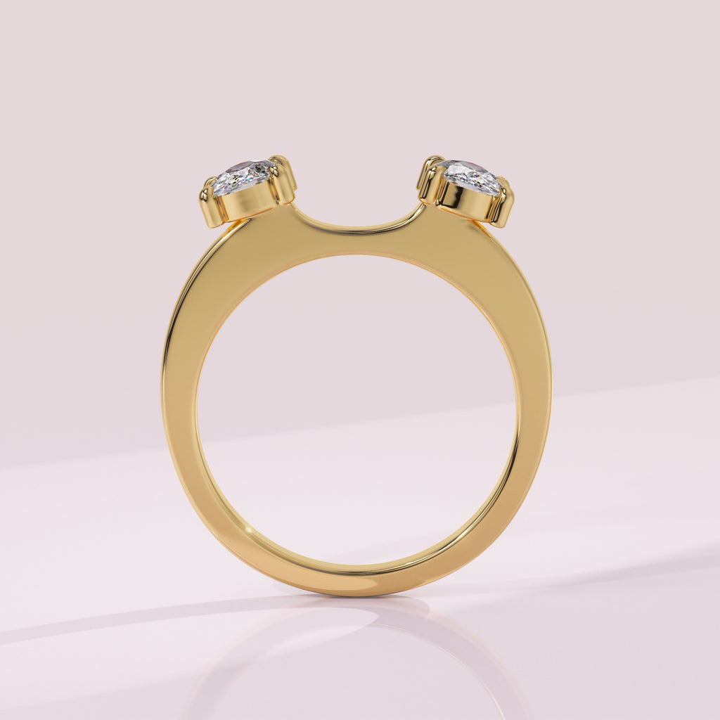 Elongated cushion diamond wrap wedding ring enhancer framing a solitaire engagement ring