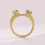 Elongated cushion diamond wrap wedding ring enhancer framing a solitaire engagement ring