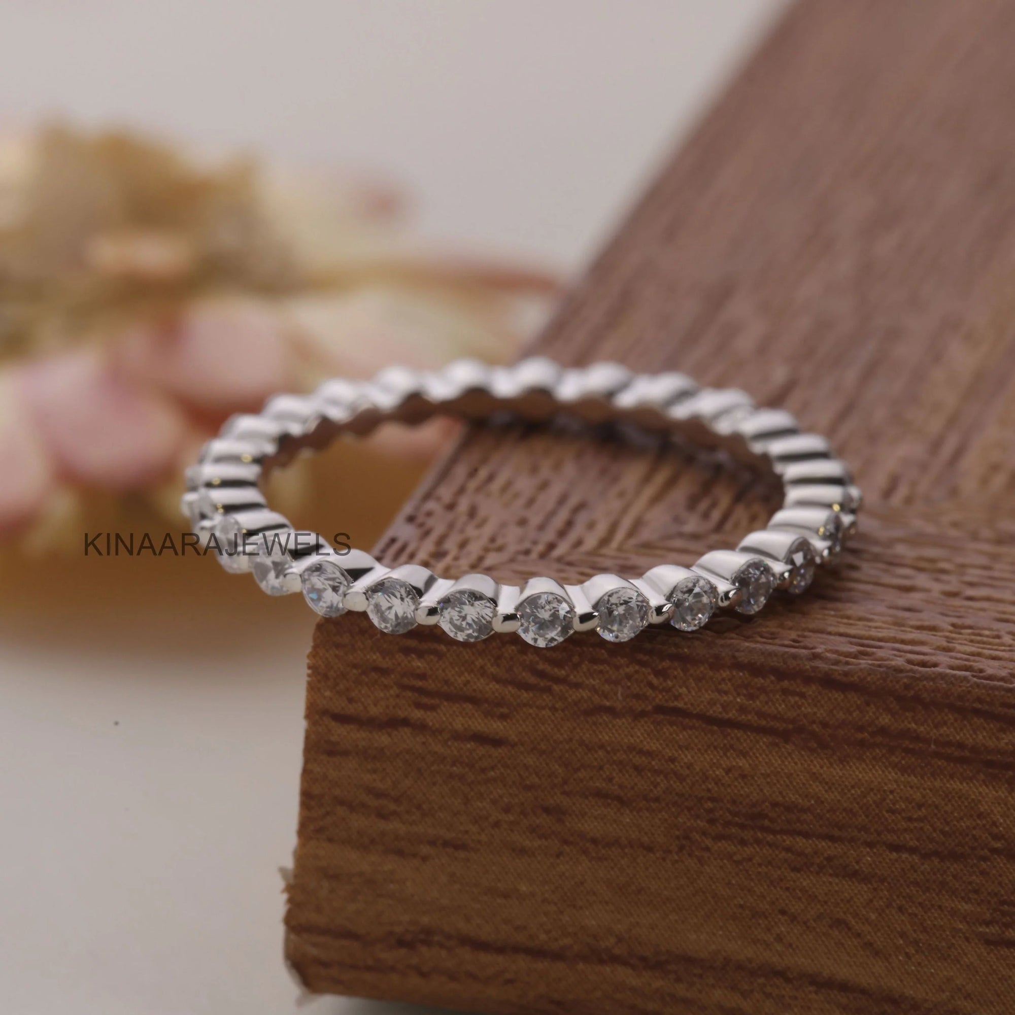 Floating Bubble Single Prong Moissanite Eternity Band