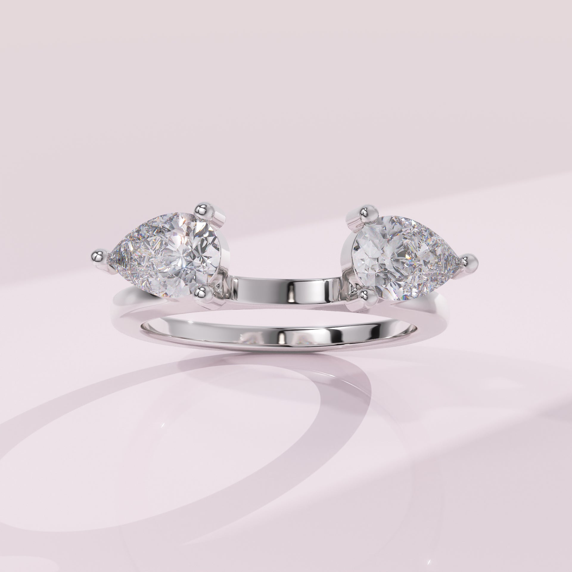 Pear cut moissanite open wrap band designed to frame a solitaire engagement ring
