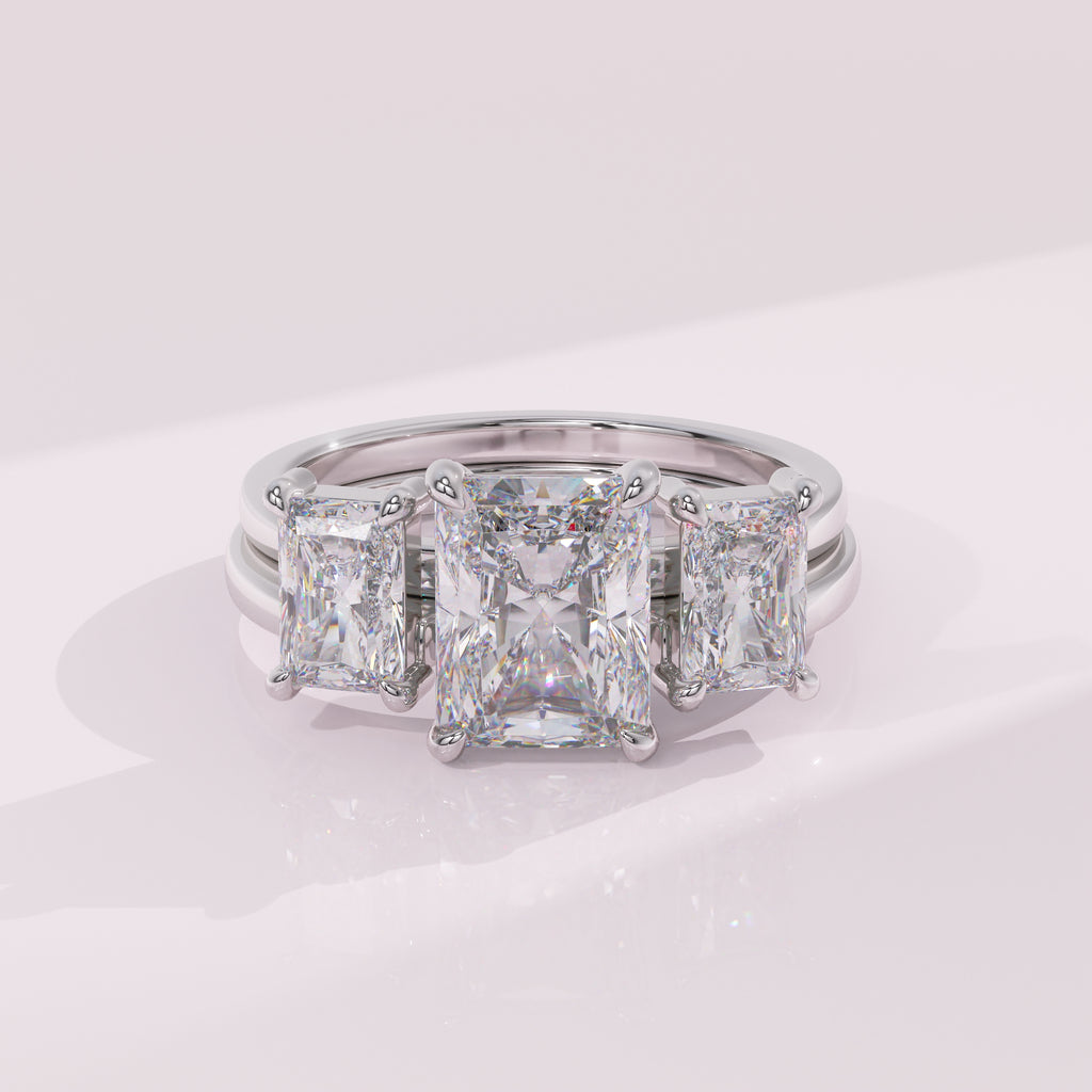 Radiant diamond stacking enhancer band paired with a solitaire engagement ring