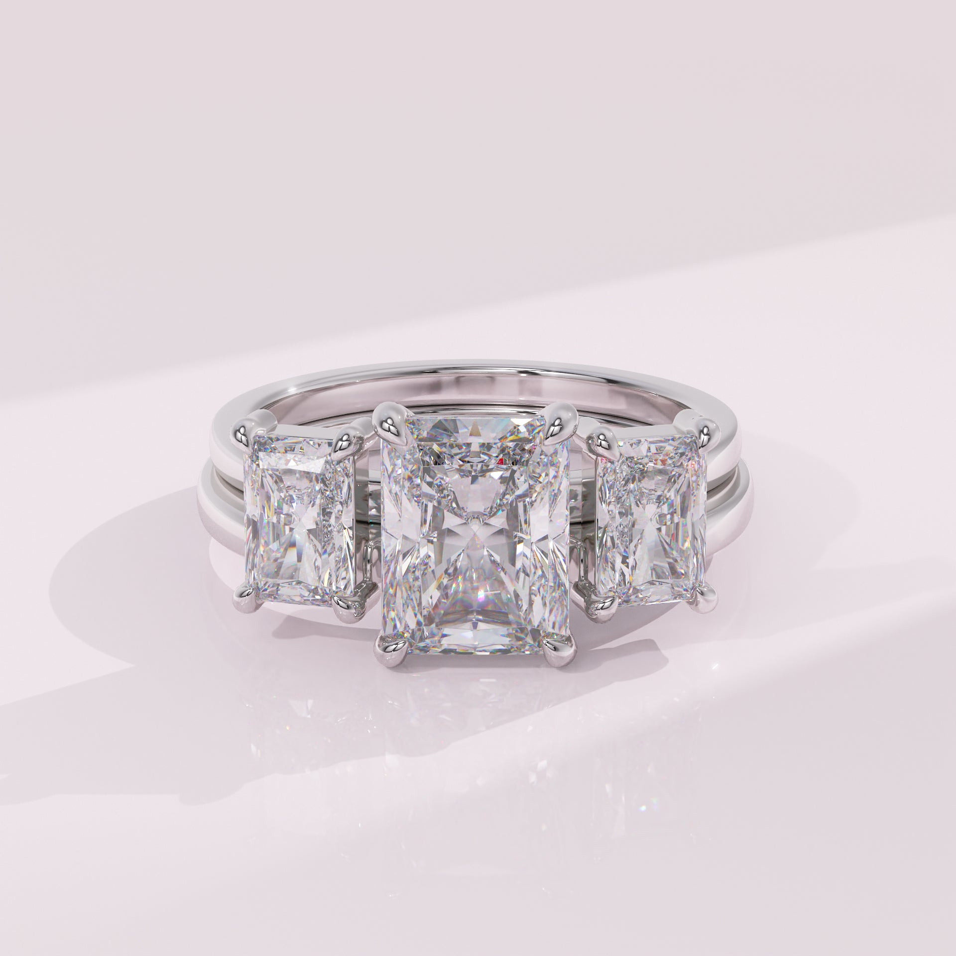 Radiant diamond stacking enhancer band paired with a solitaire engagement ring