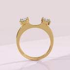 Radiant diamond wrap wedding ring enhancer framing a solitaire engagement ring
