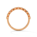 Round Cut Mossanite Bezel Set Eternity Wedding Band in 10K rose gold