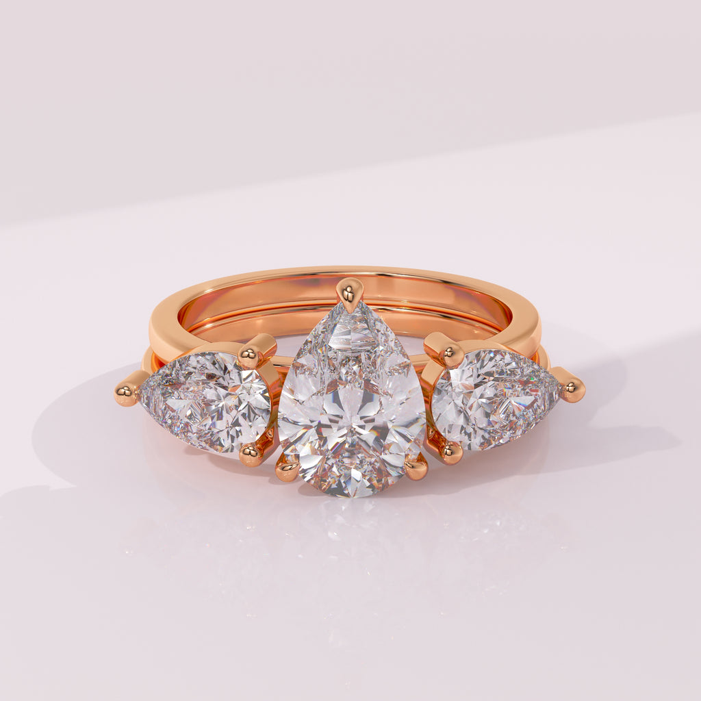 Solid gold pear moissanite wrap ring enhancer with twin pear shaped stones