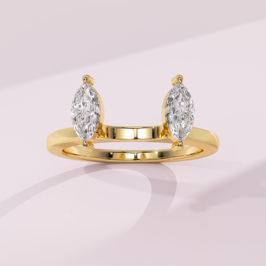 Twin marquise diamond ring guard crafted to enhance a solitaire engagement ring with a balanced design.