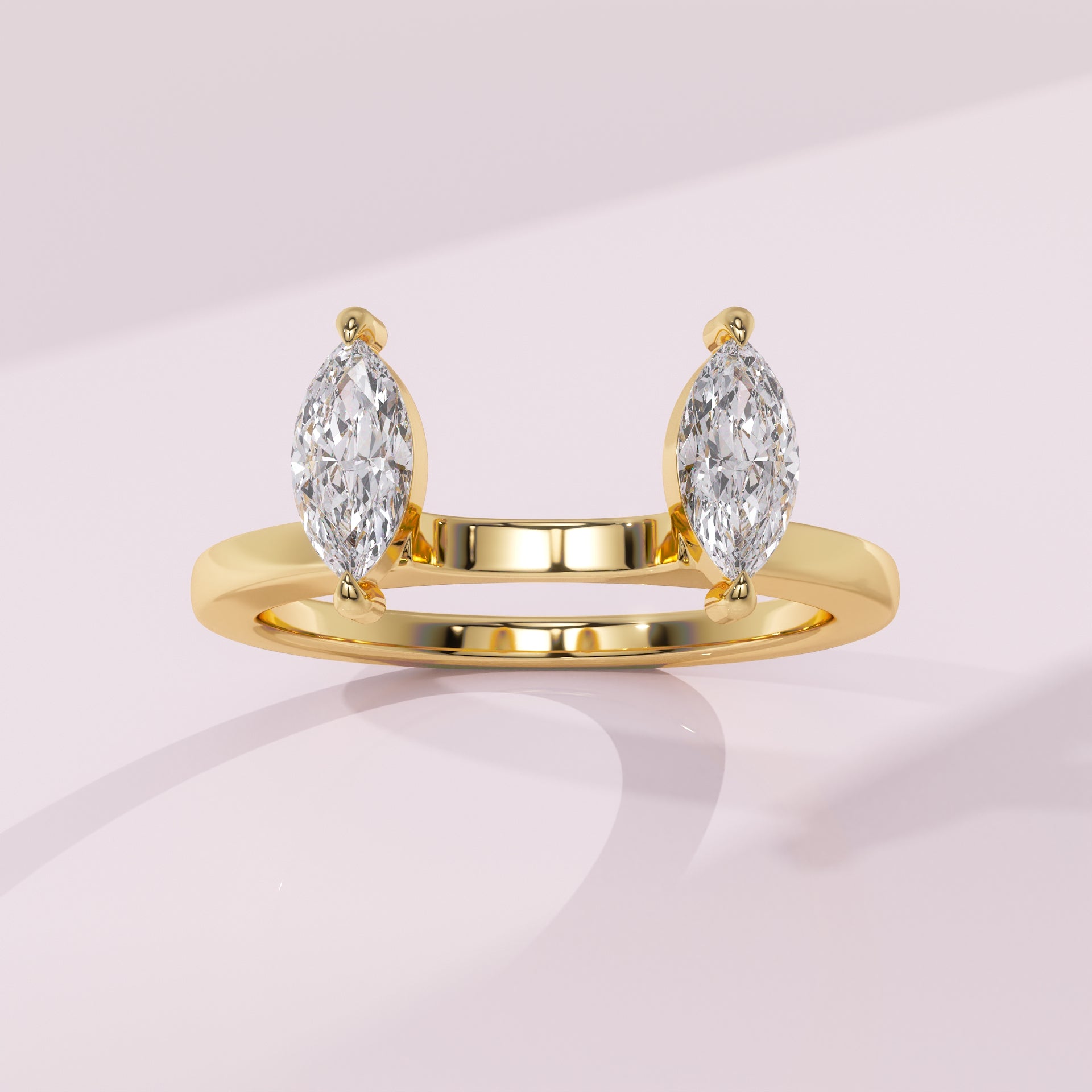 Twin marquise diamond ring guard crafted to enhance a solitaire engagement ring with a balanced design.