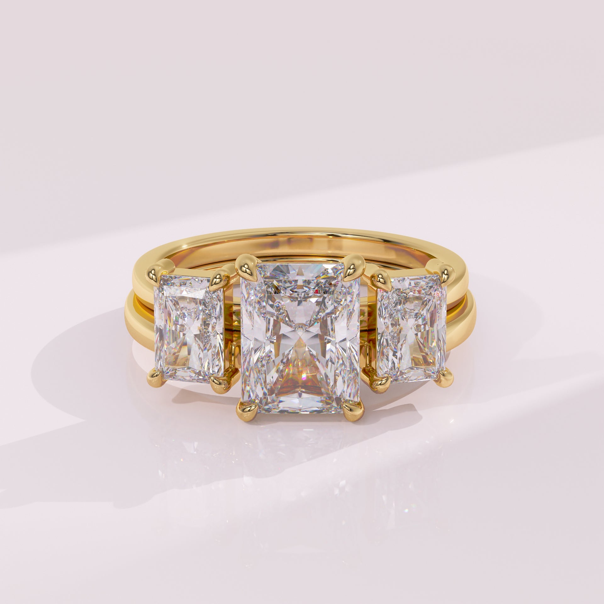 Twin radiant moissanite contour wedding band designed for solitaire engagement rings
