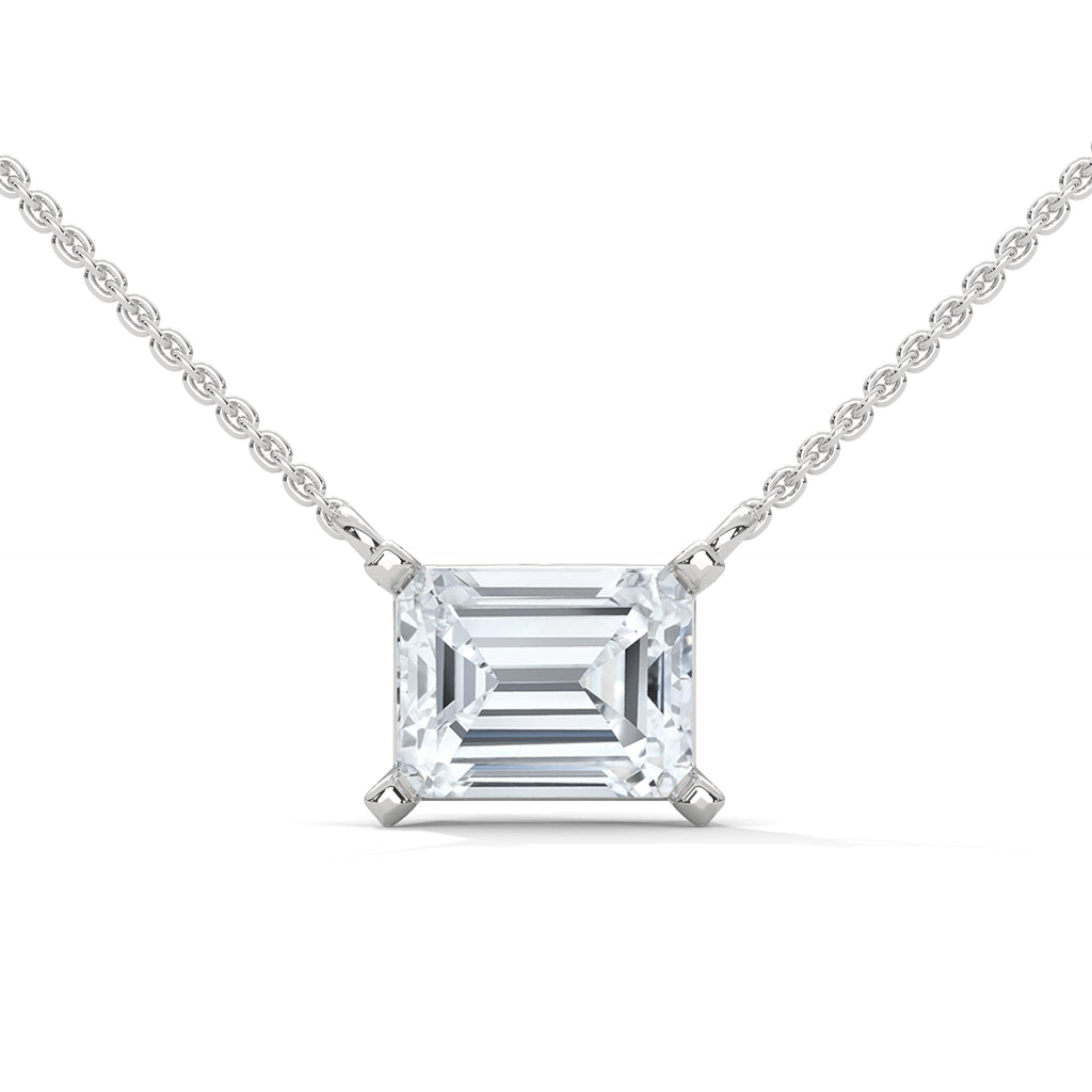 east west emerald diamond solitaire pendant