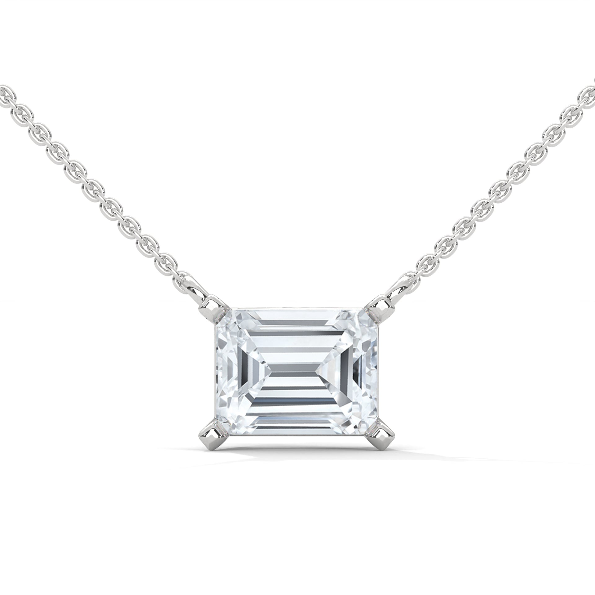 east west emerald diamond solitaire pendant
