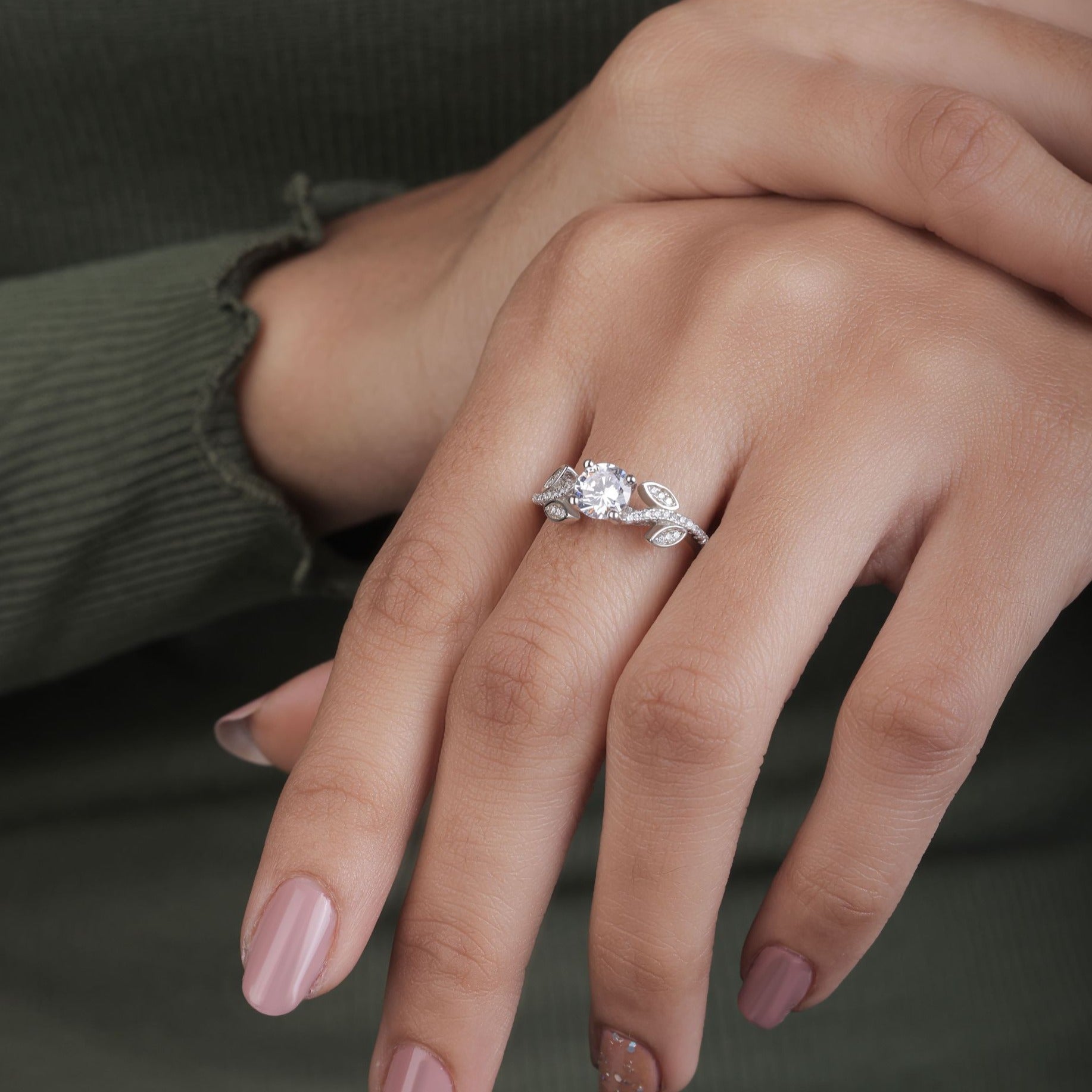 round cut Moissanite with leaf design engagement ring
