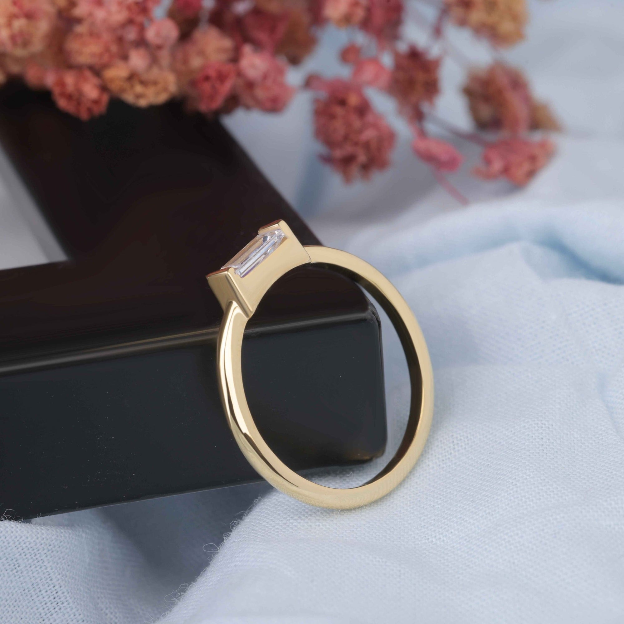 baguette cut solitaire engagement ring
