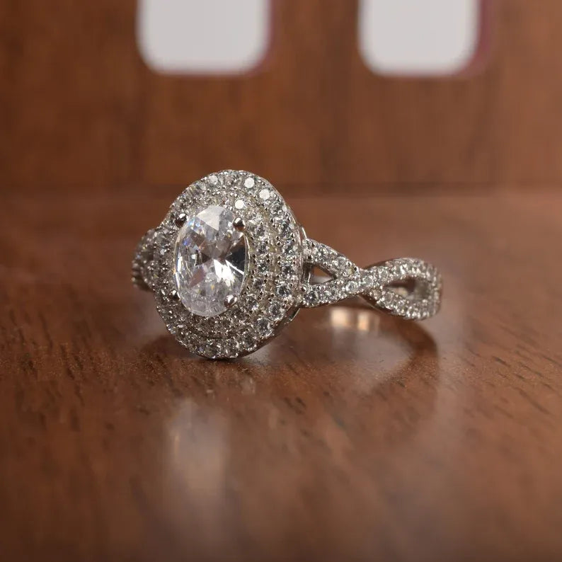 "Oval Cut Diamond Double Halo Twisted Split Shank Wedding Ring - Kinaara Jewels
"