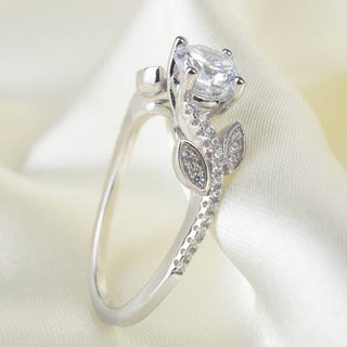 round diamond leaf engagement ring