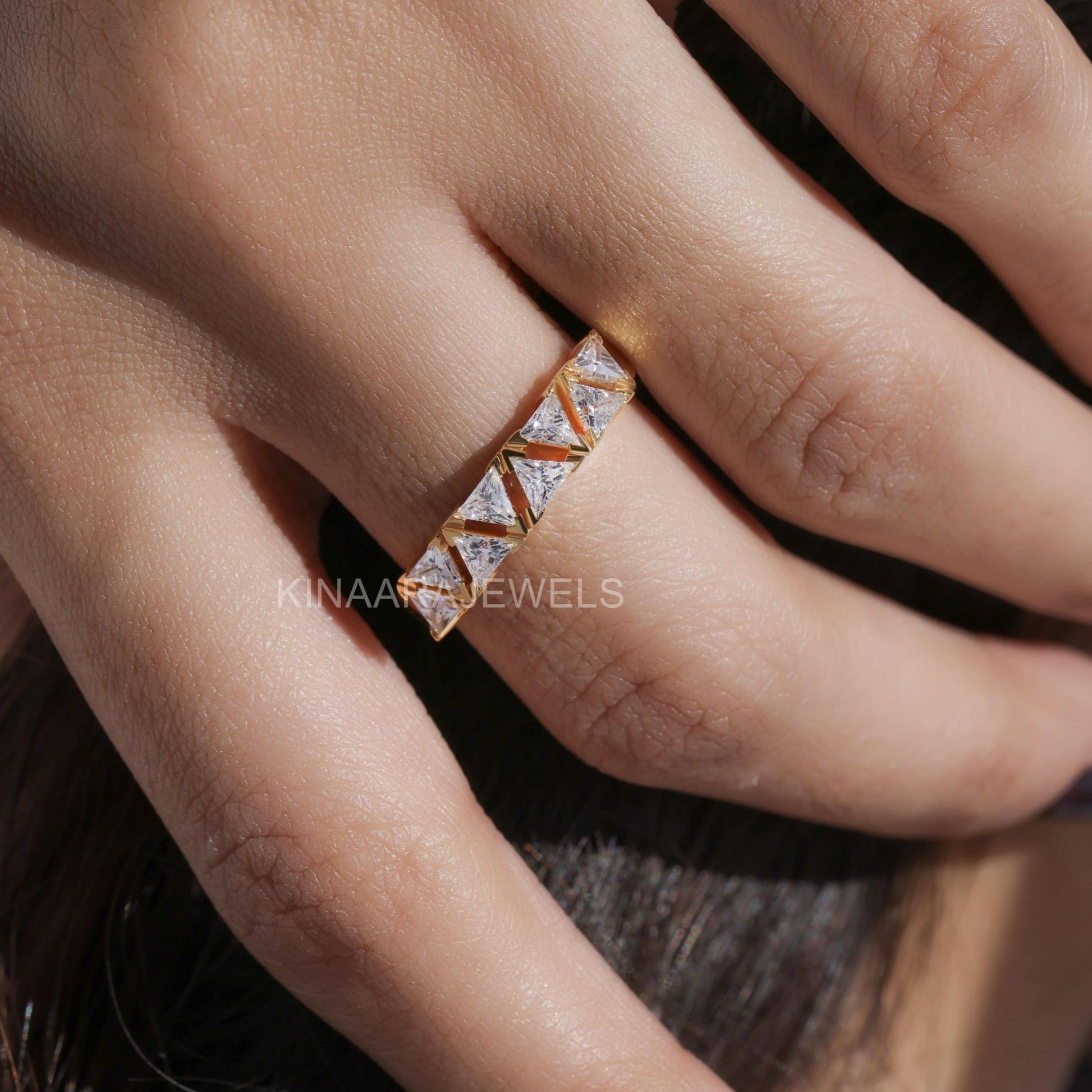 triangle cut diamond engagement rings