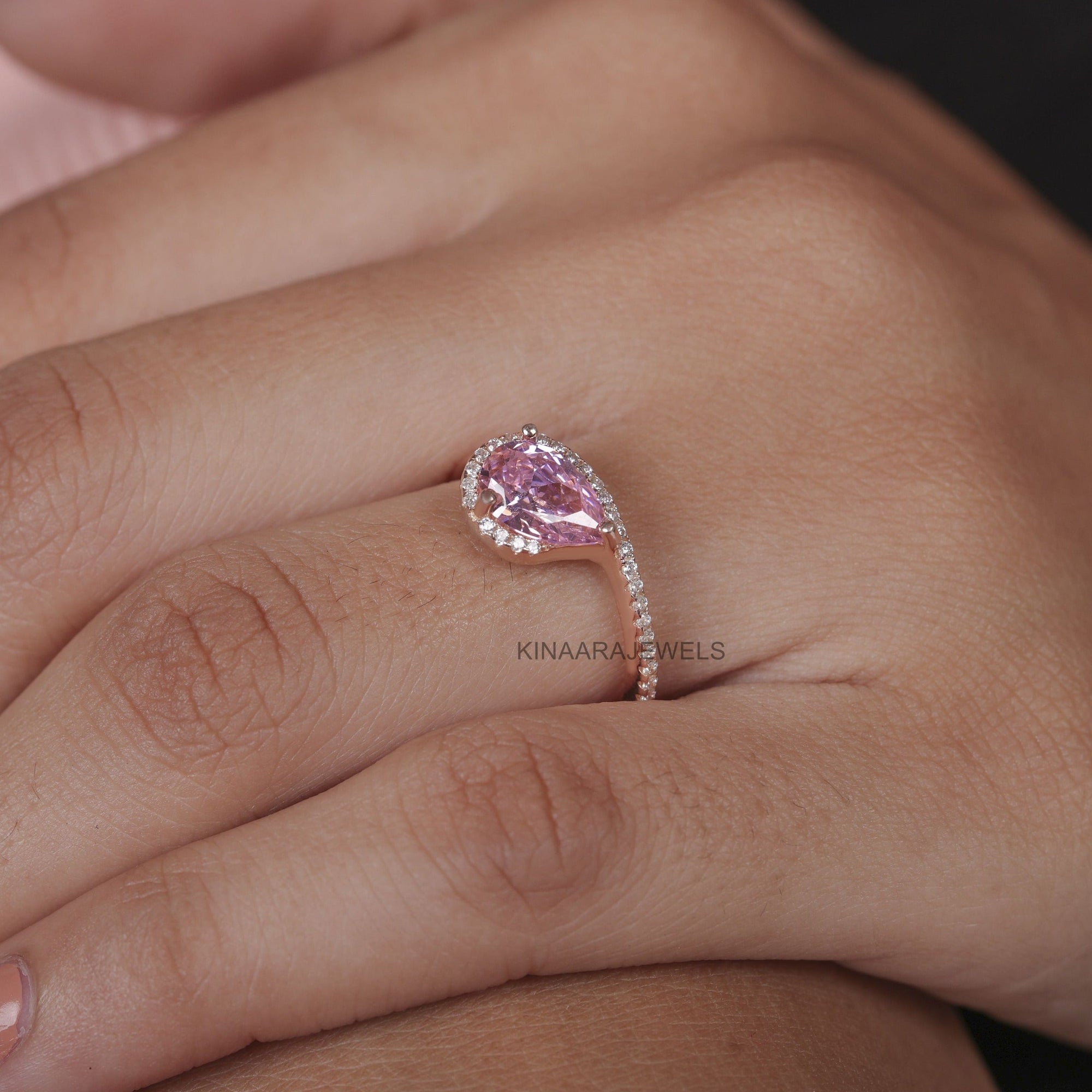 pear cut pink stone engagement ring