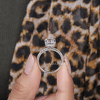 emerald cut hidden halo engagement rings