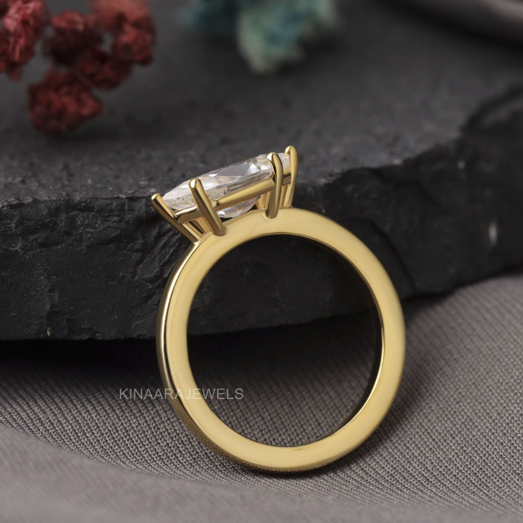 east west marquise engagement ring