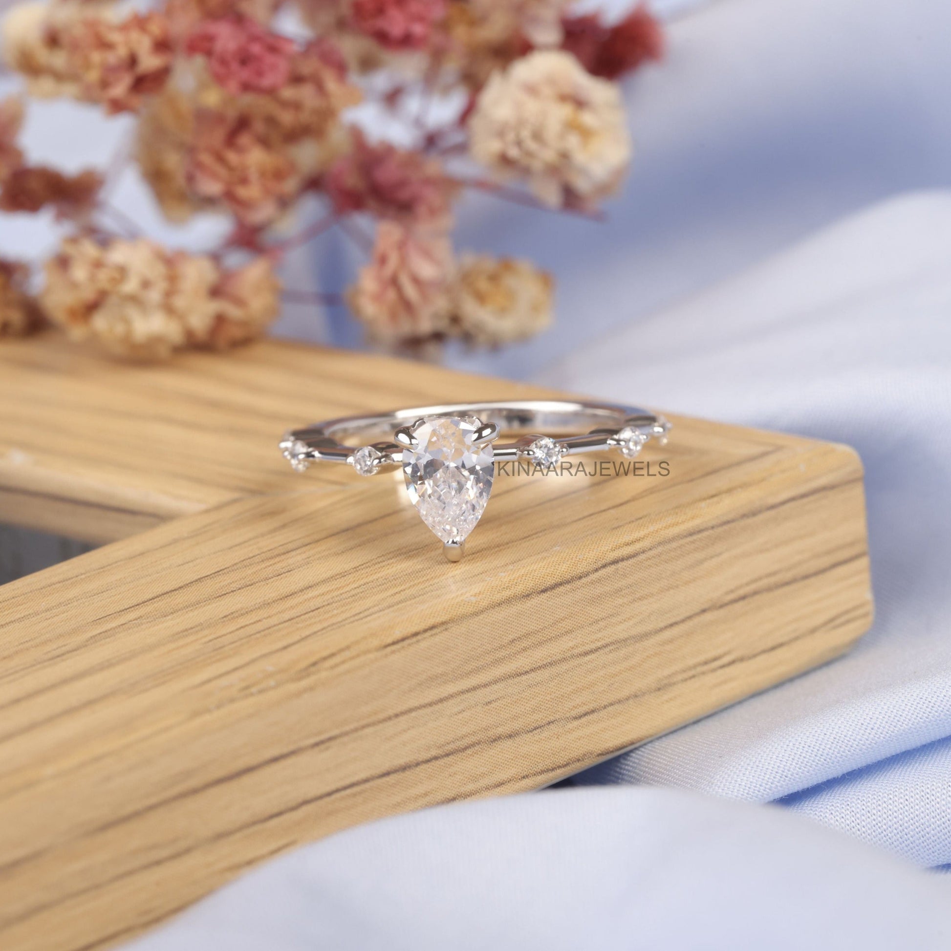 0.66 CT Pear Cut Lab Grown Diamond 14K White Gold Engagement Ring