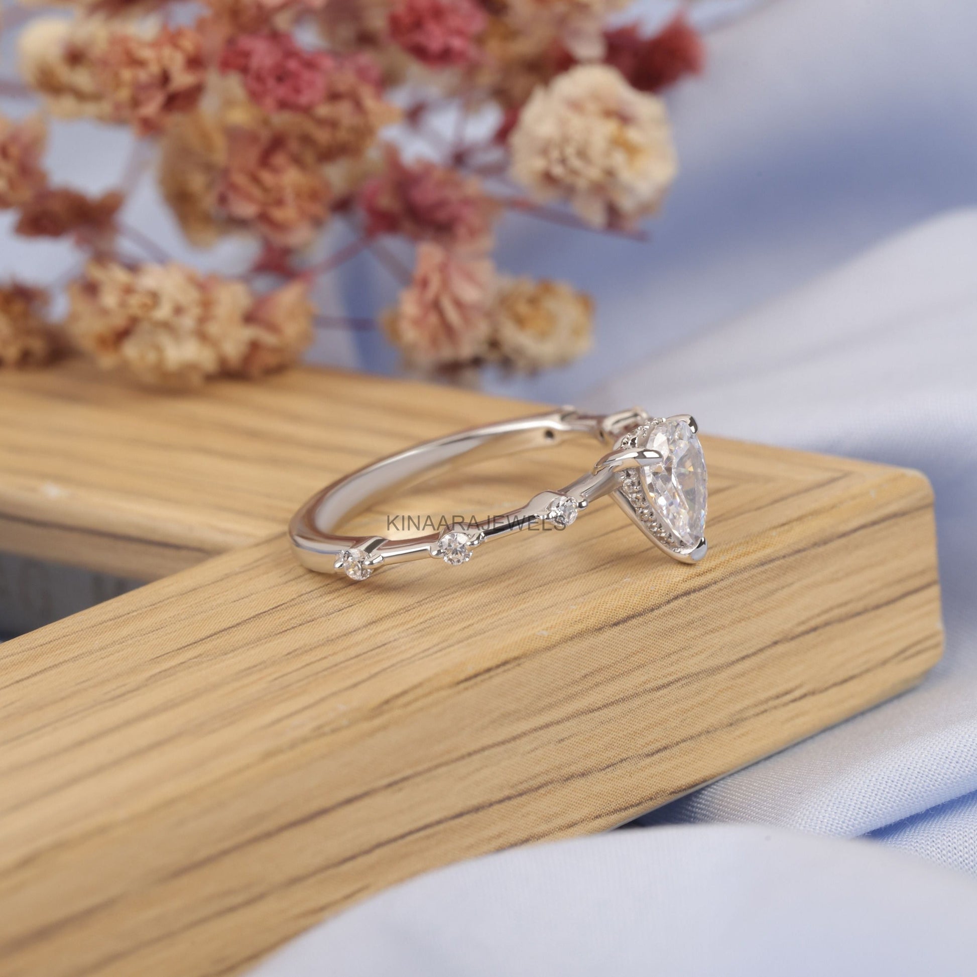 0.66 CT Pear Cut Lab Grown Diamond 14K White Gold Ring - Kinaara Jewels