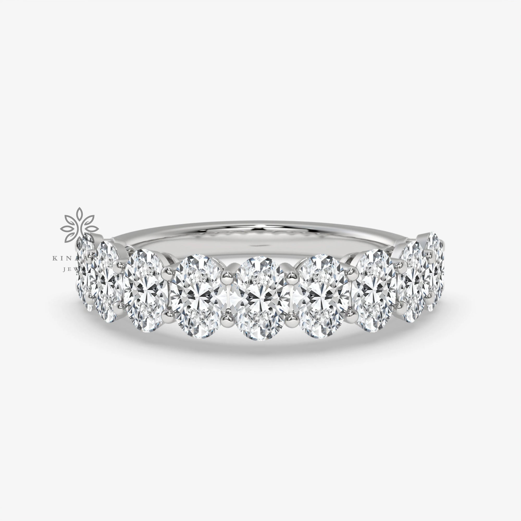 Oval moissanite half eternity band in white gold