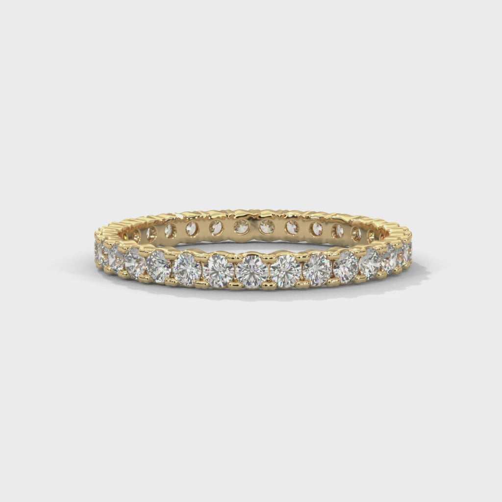 wedding band with bezel set in 18K Yellow Gold

