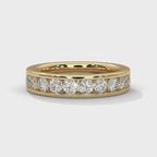 18K Gold Round Cut Moissanite Channel Set Wedding Band in 10K gold

