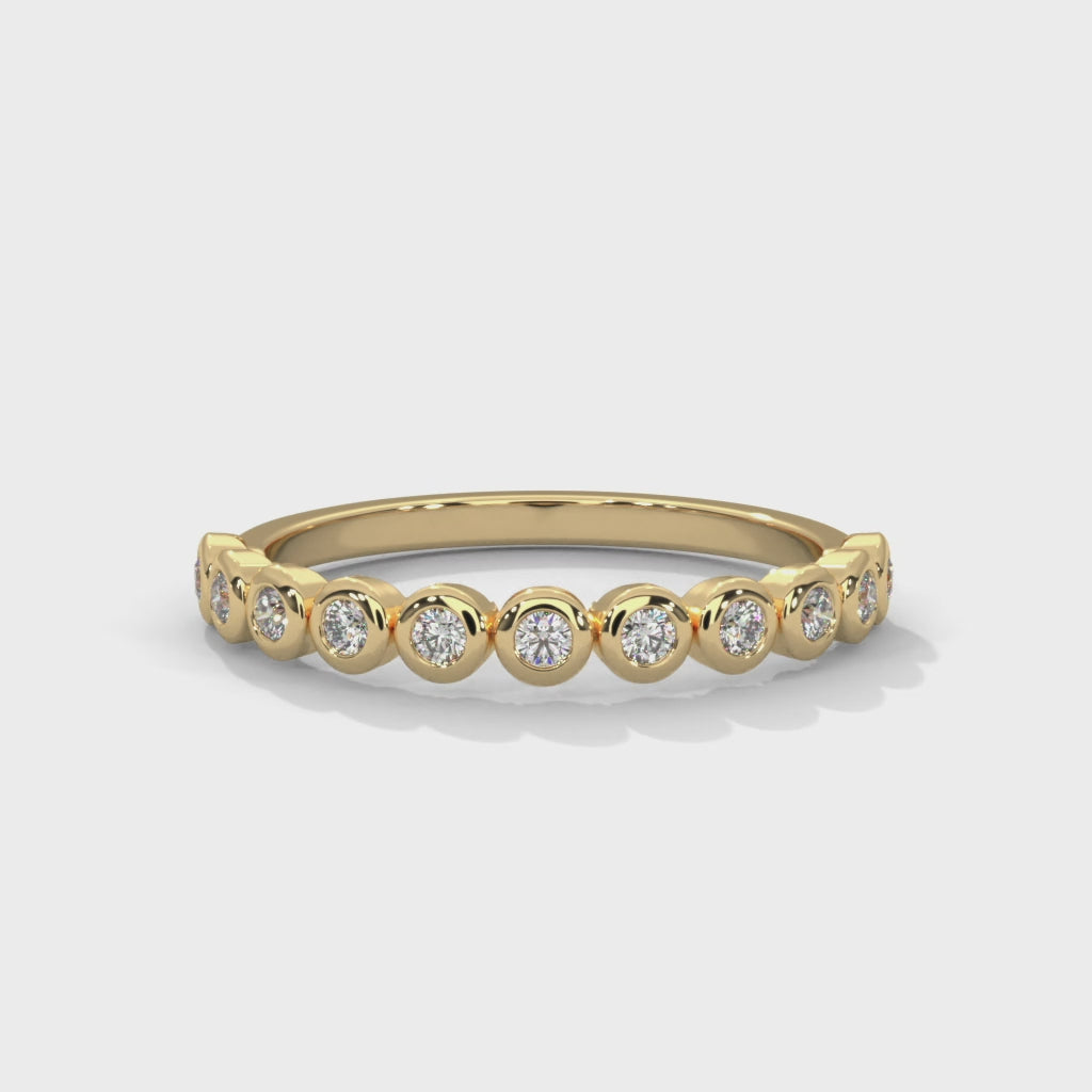Round Cut Mossanite Bezel Set Eternity Wedding Band in 10K Gold