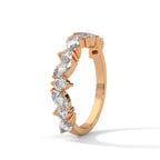 round and marquise cut moissanite half eternity band in rose gold