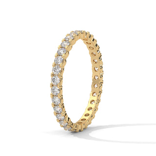 wedding band with bezel set in Yellow Gold
